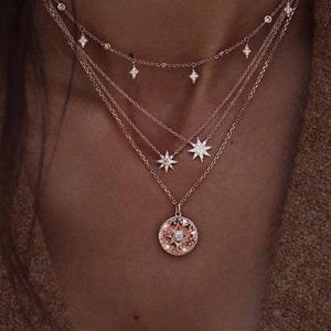 Four Gold Chain Set of Link Necklaces Starburst Sun Charms with Large Medallion
